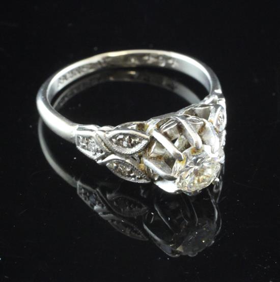 An 18ct white gold and platinum single stone diamond ring, size N.